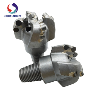 PDC four-wing spiral arc angle coreless drill bit